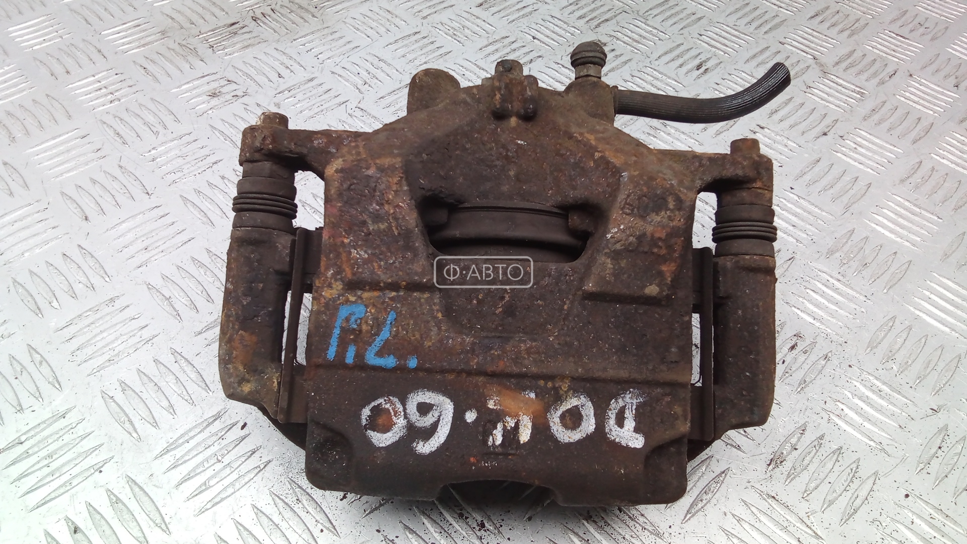 Суппорт тормозной передний левый