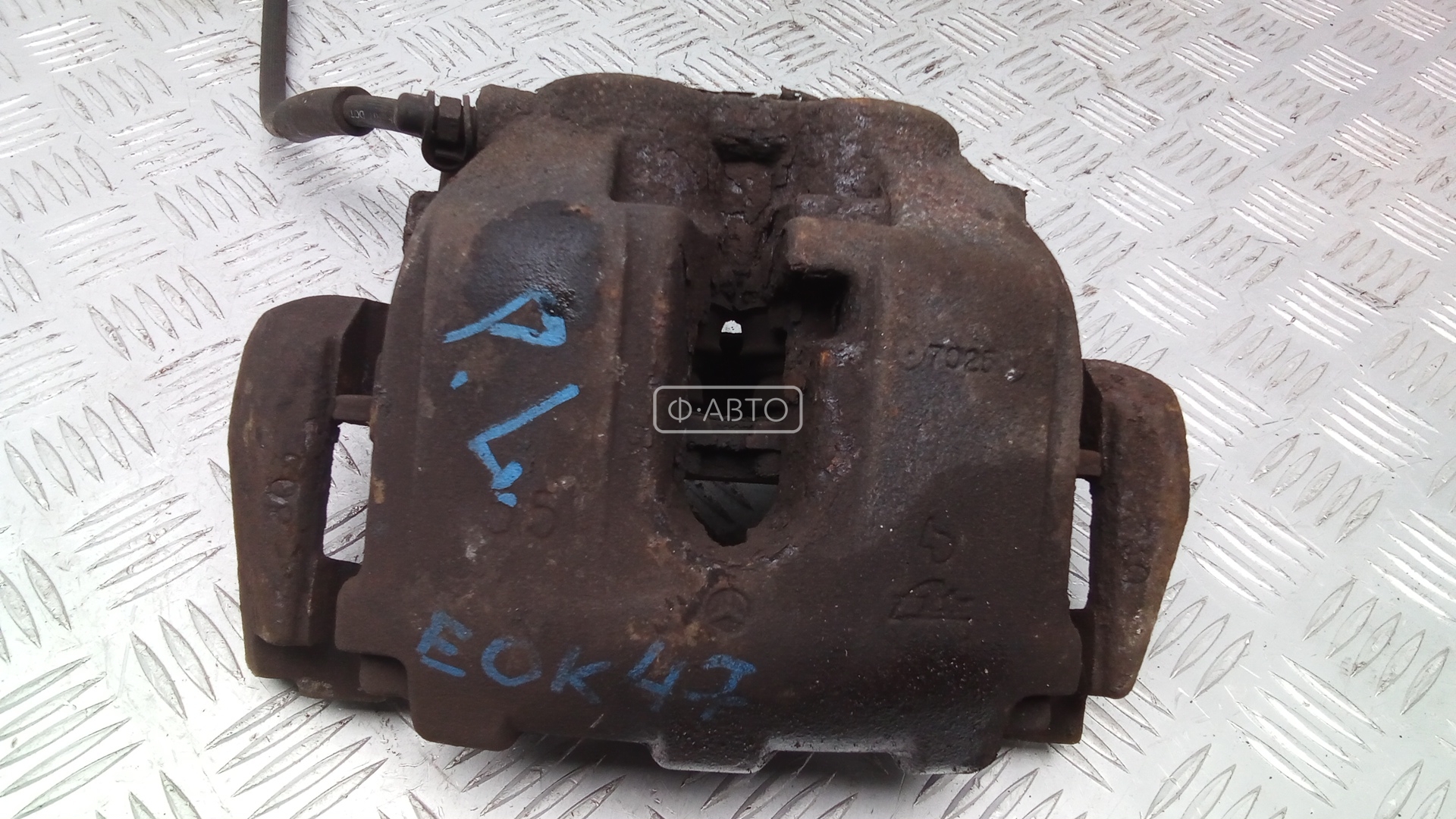 Суппорт тормозной передний левый