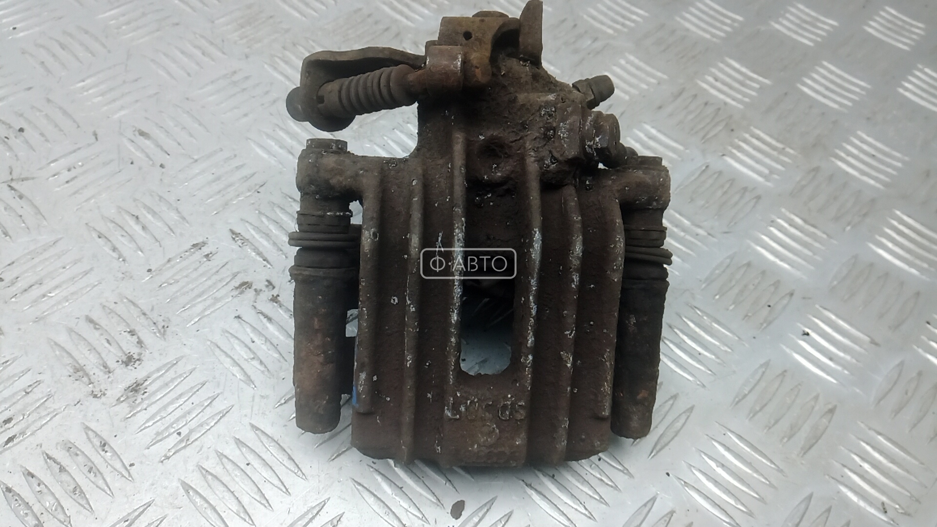 Суппорт тормозной задний правый