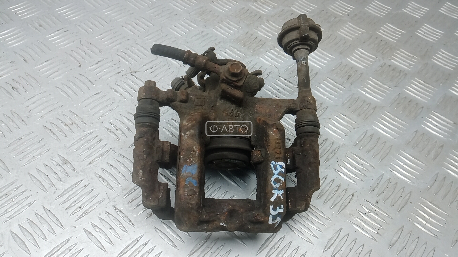 Суппорт тормозной задний левый