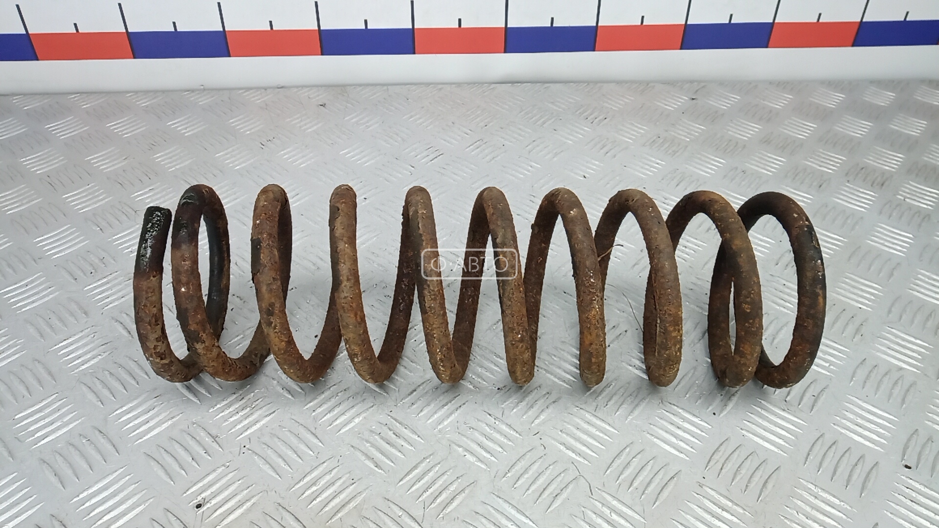 Пружина задняя