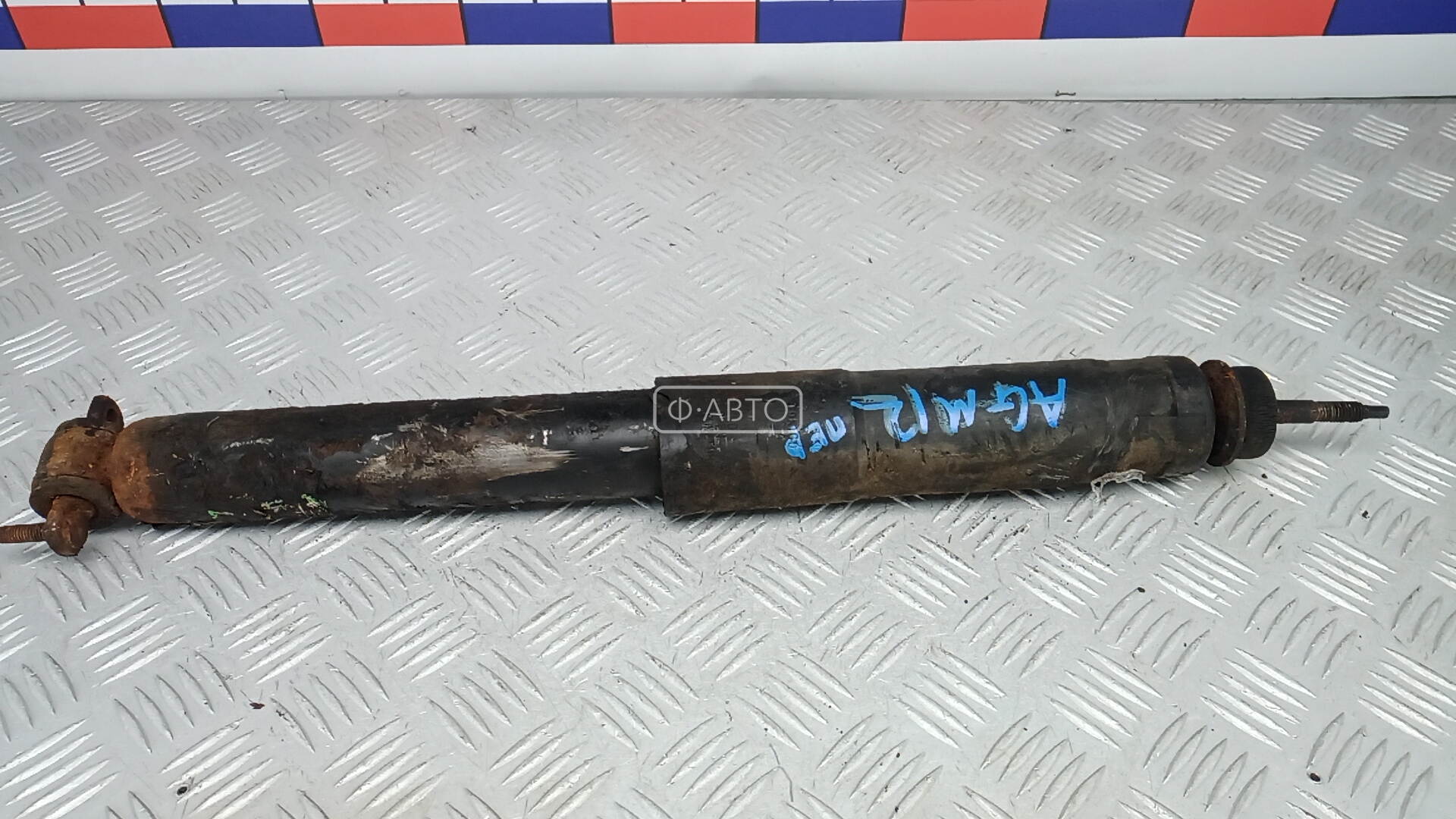 Амортизатор передний левый