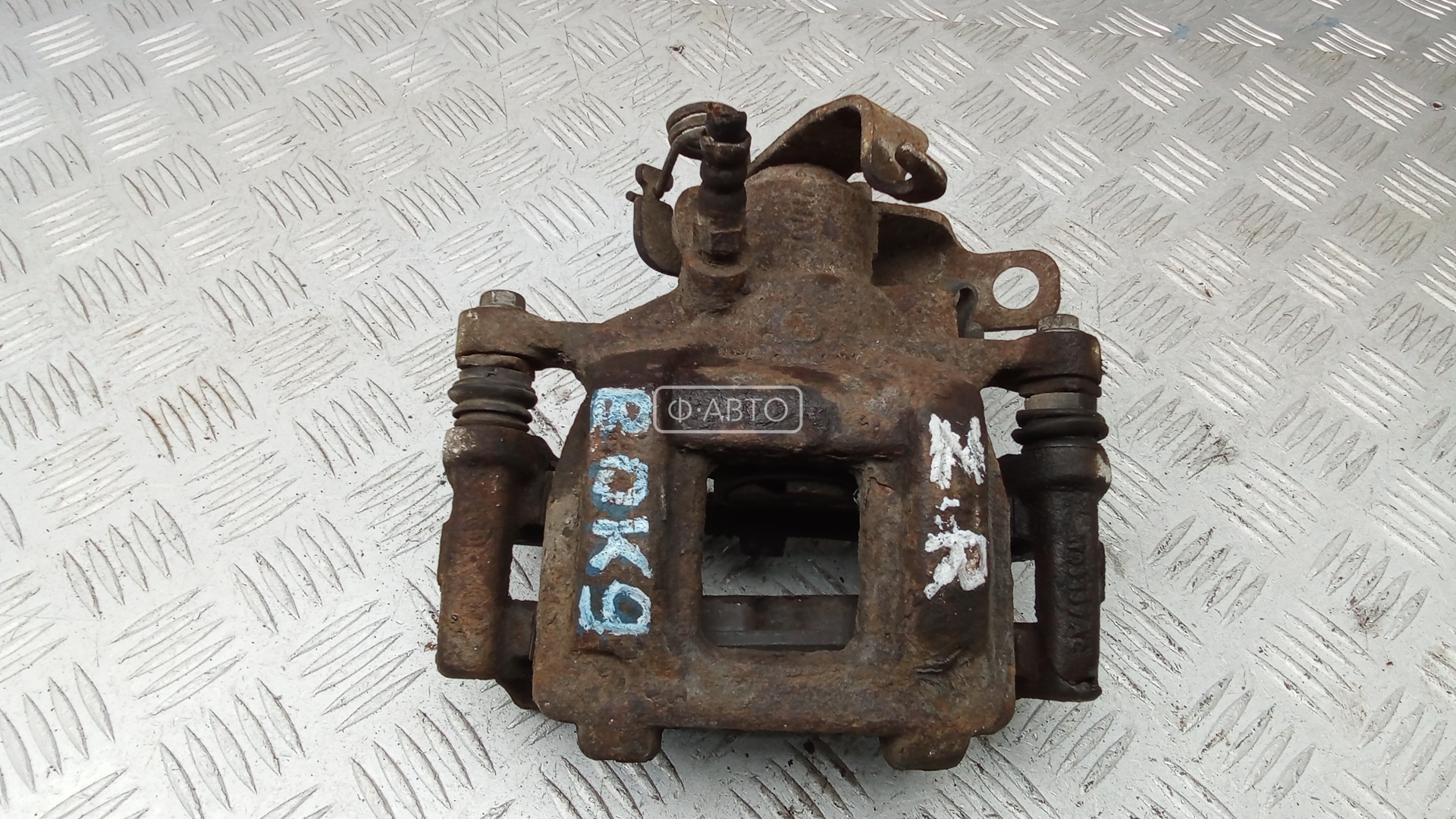 Суппорт тормозной задний правый