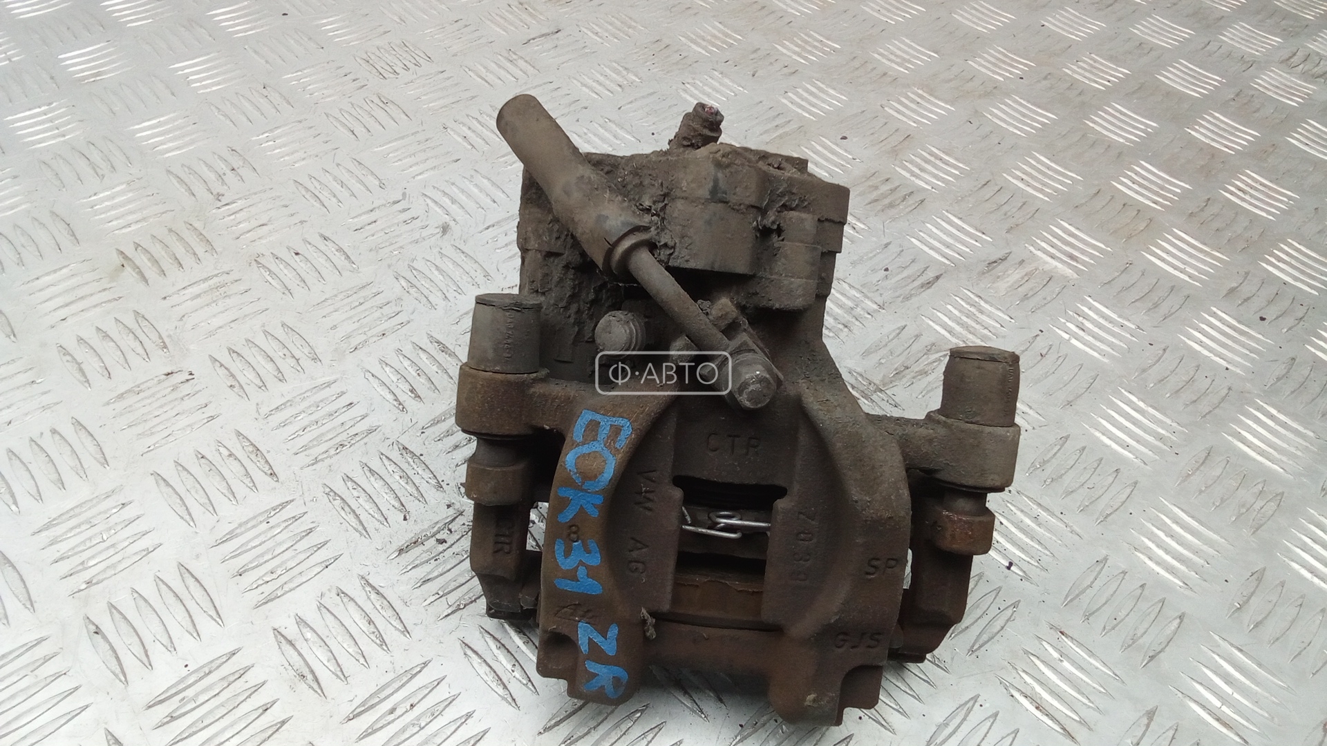 Суппорт тормозной задний правый