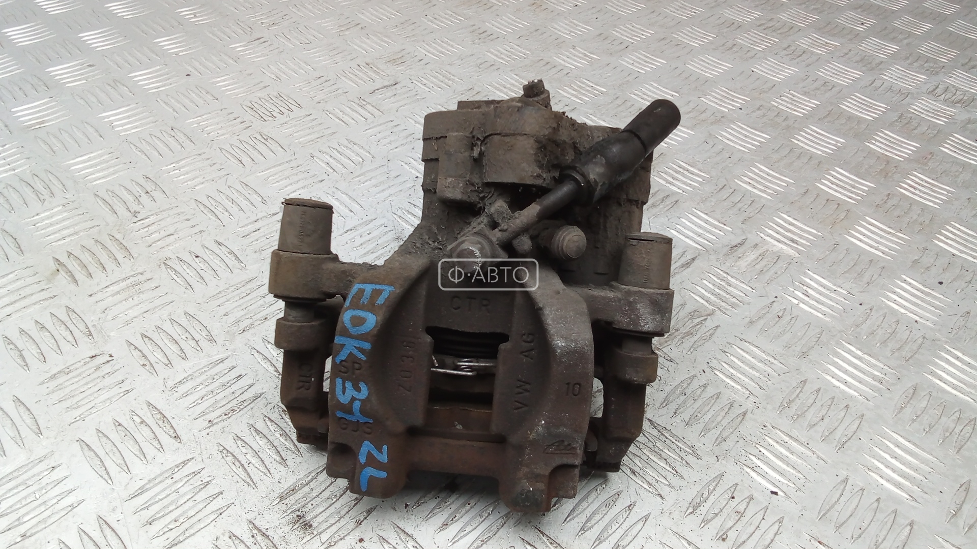 Суппорт тормозной задний левый