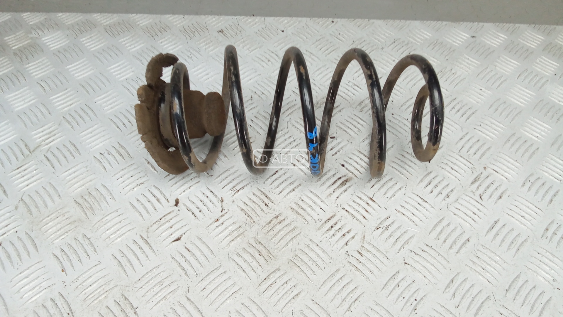 Пружина задняя