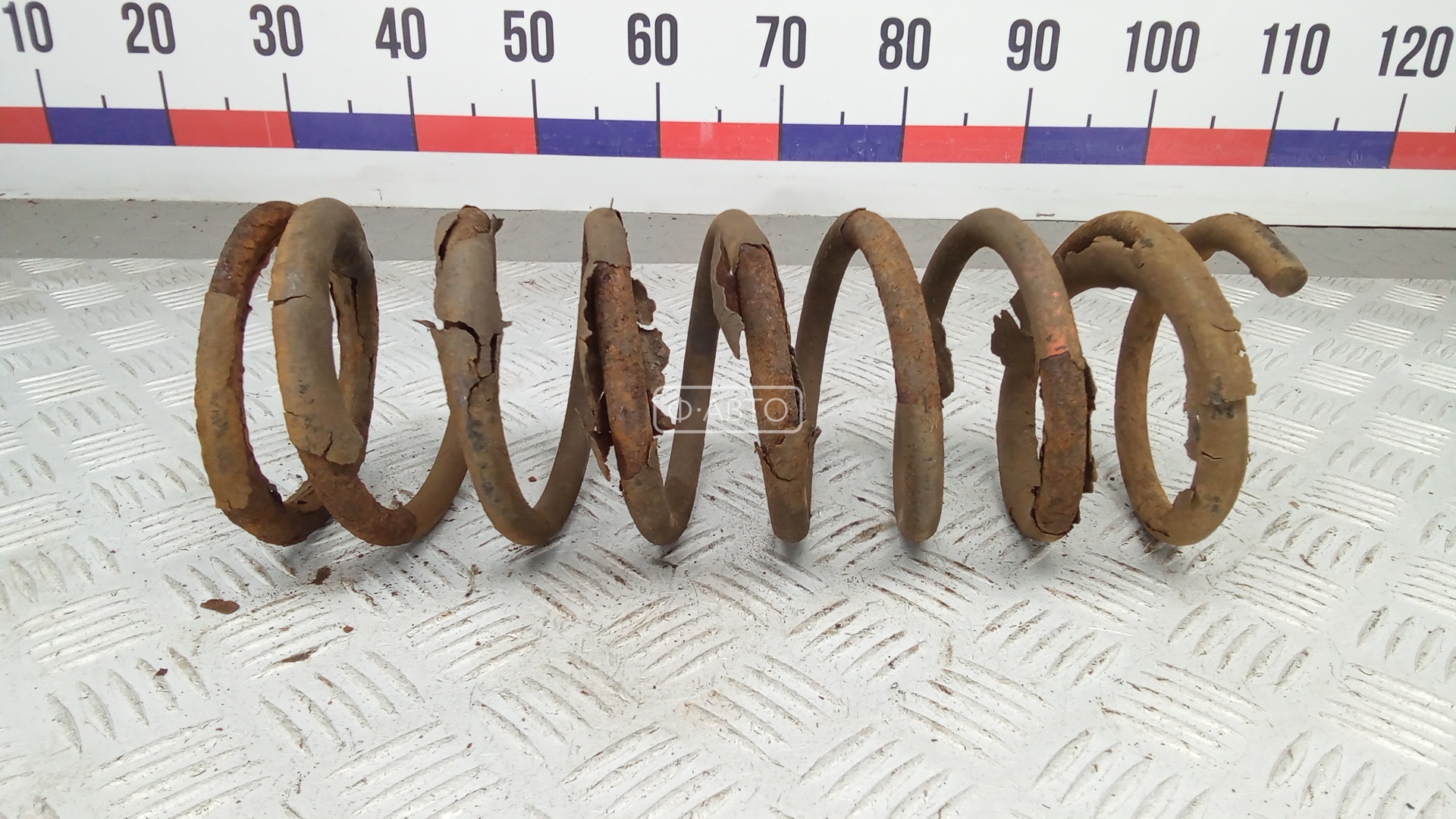 Пружина задняя