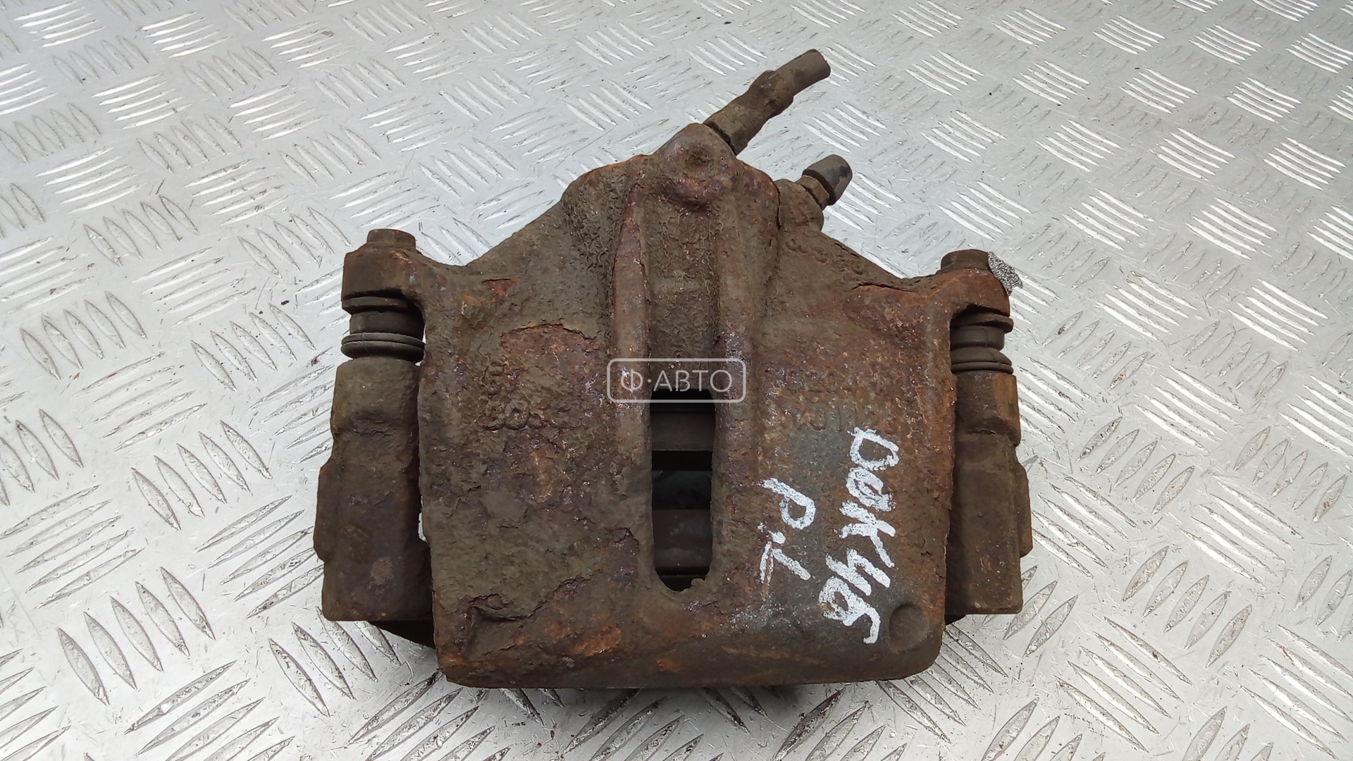 Суппорт тормозной передний левый