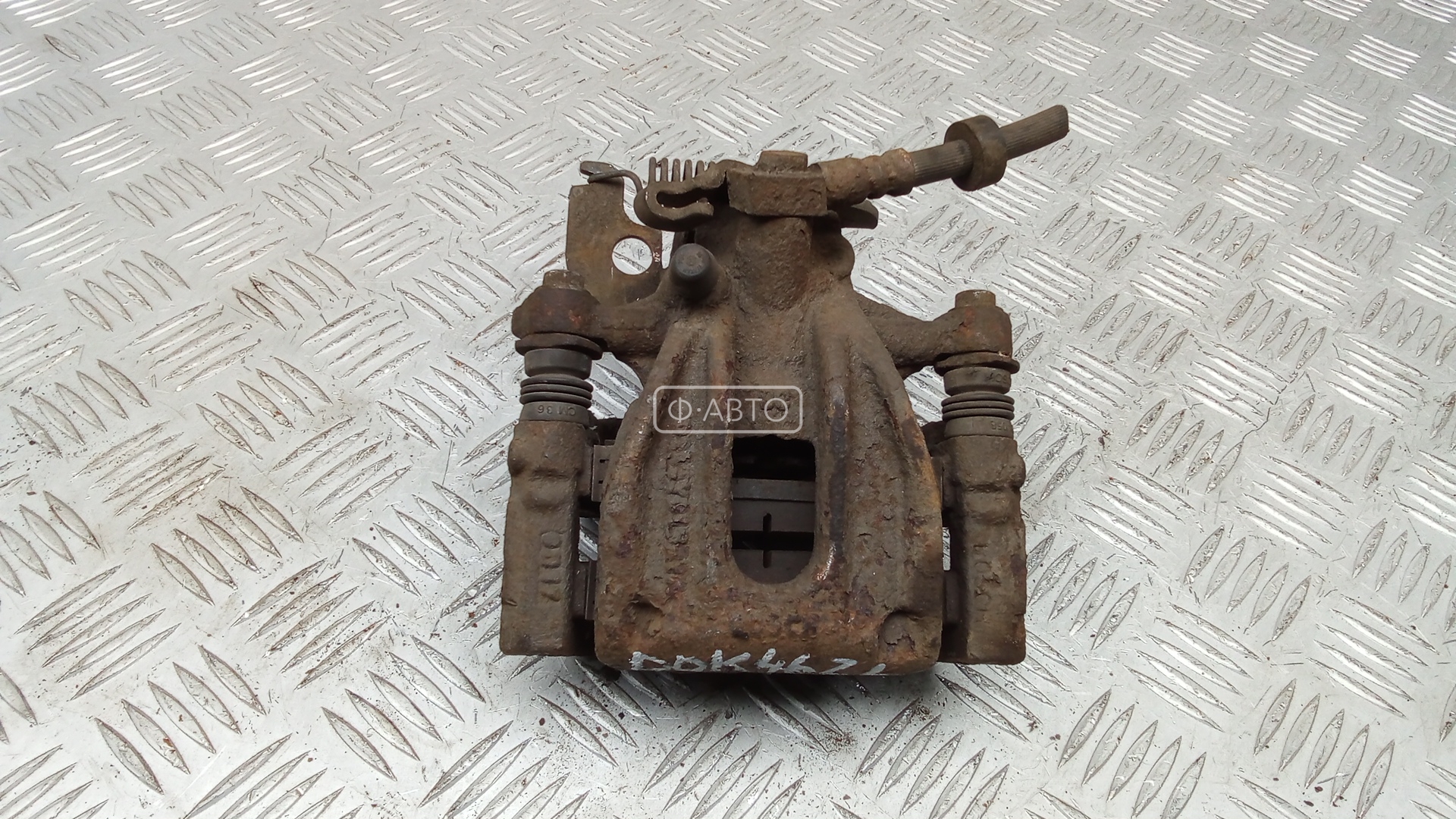 Суппорт тормозной задний левый