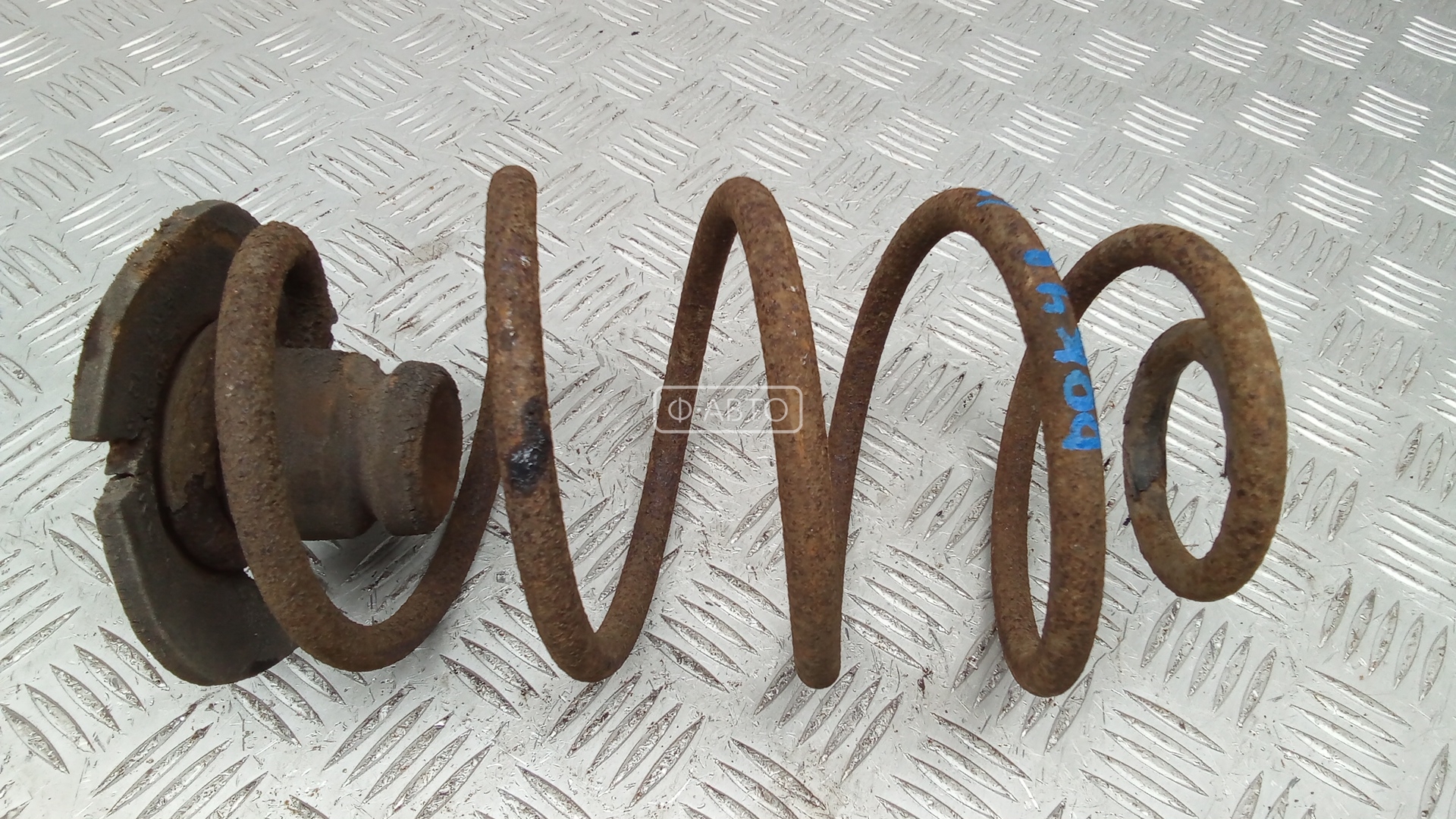 Пружина задняя