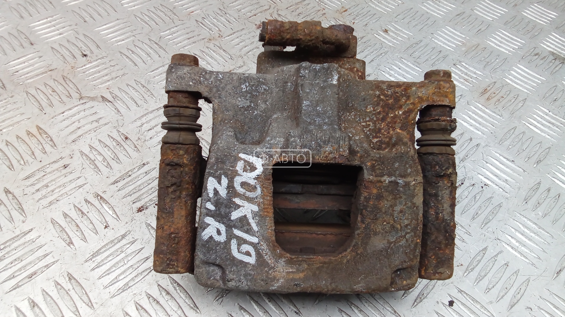 Суппорт тормозной задний правый