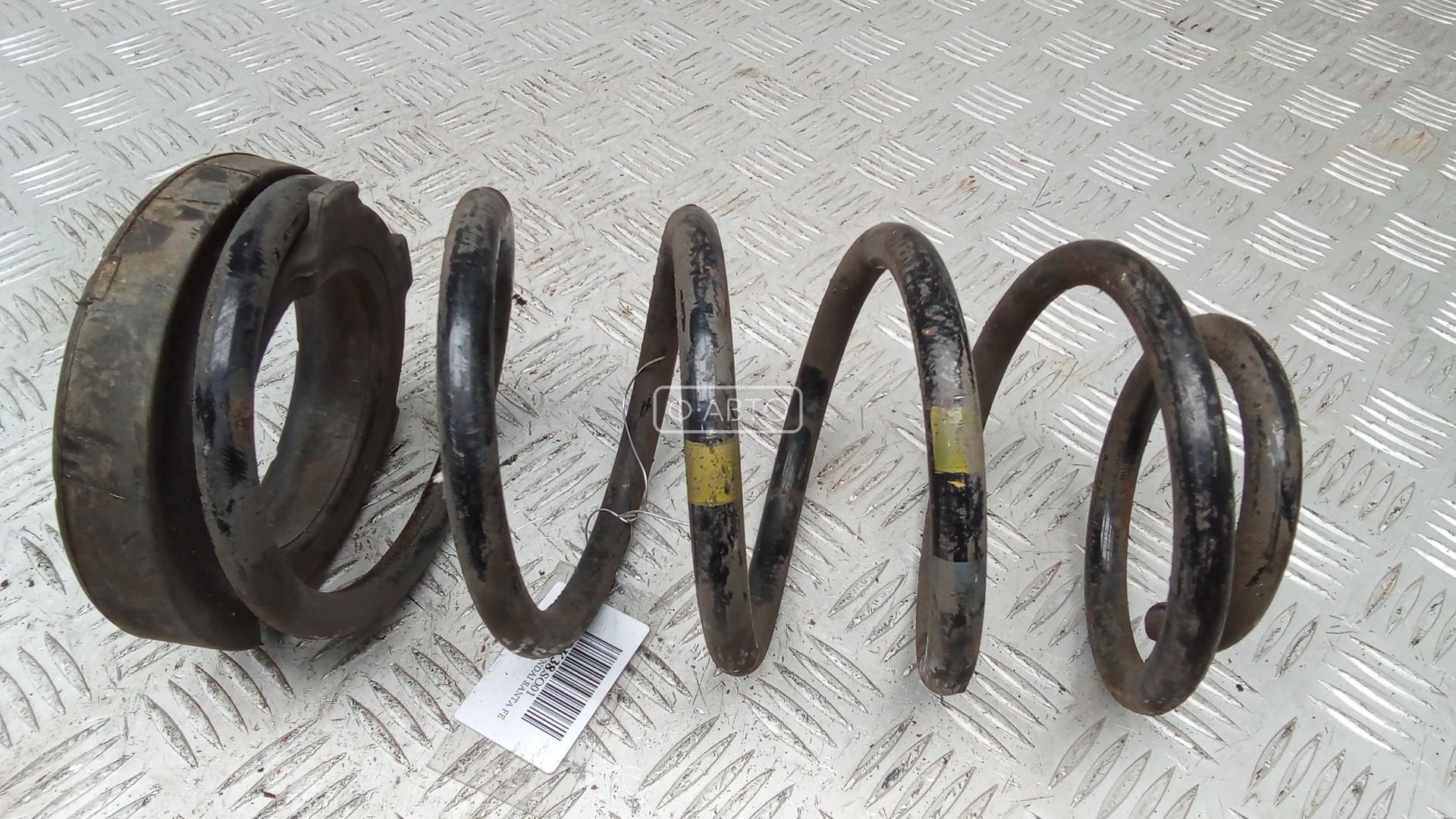 Пружина задняя