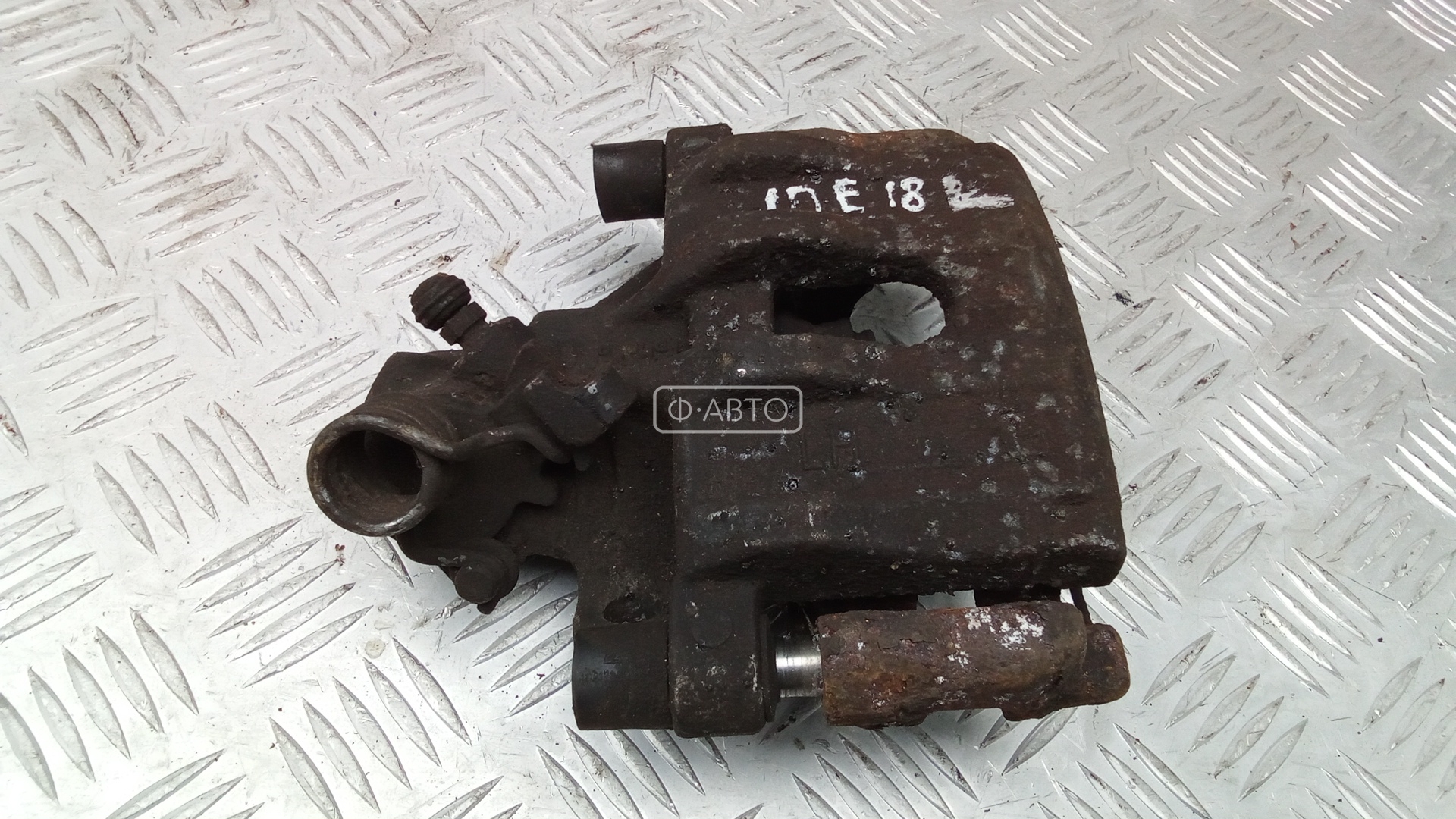 Суппорт тормозной задний левый