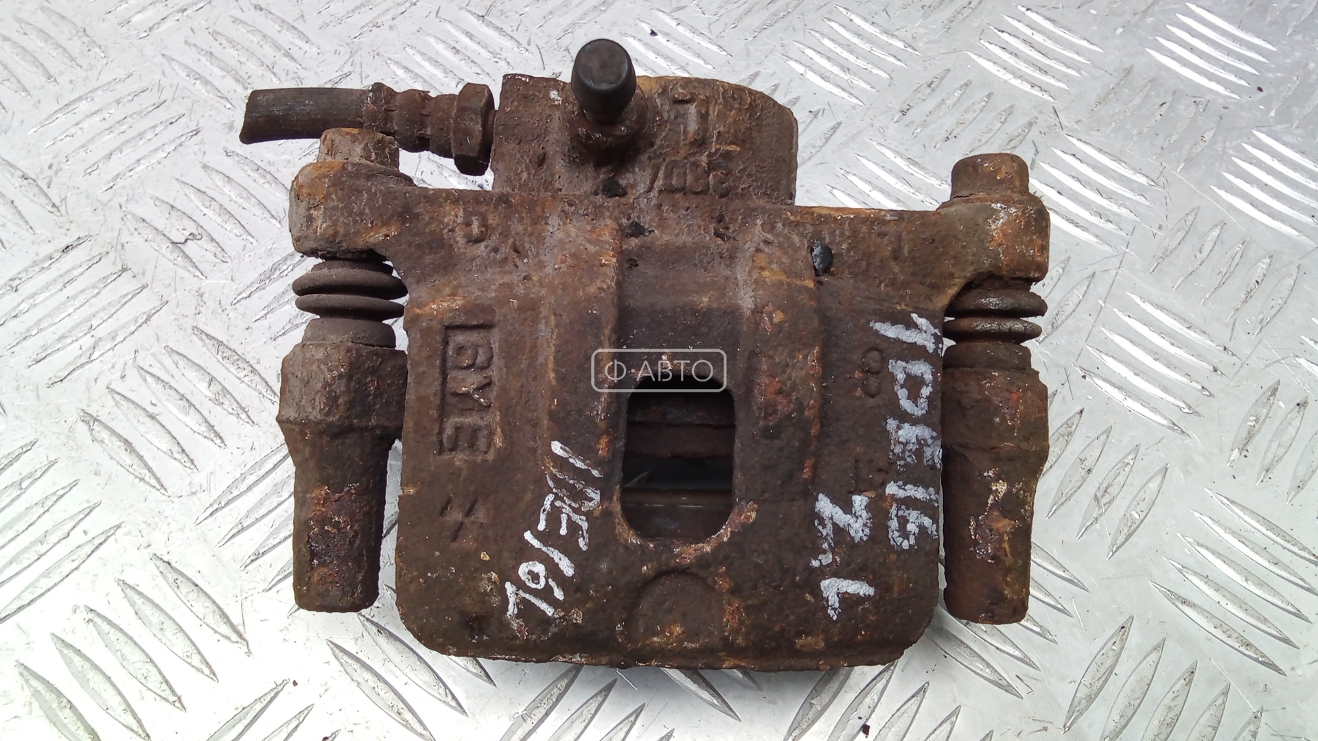 Суппорт тормозной задний левый