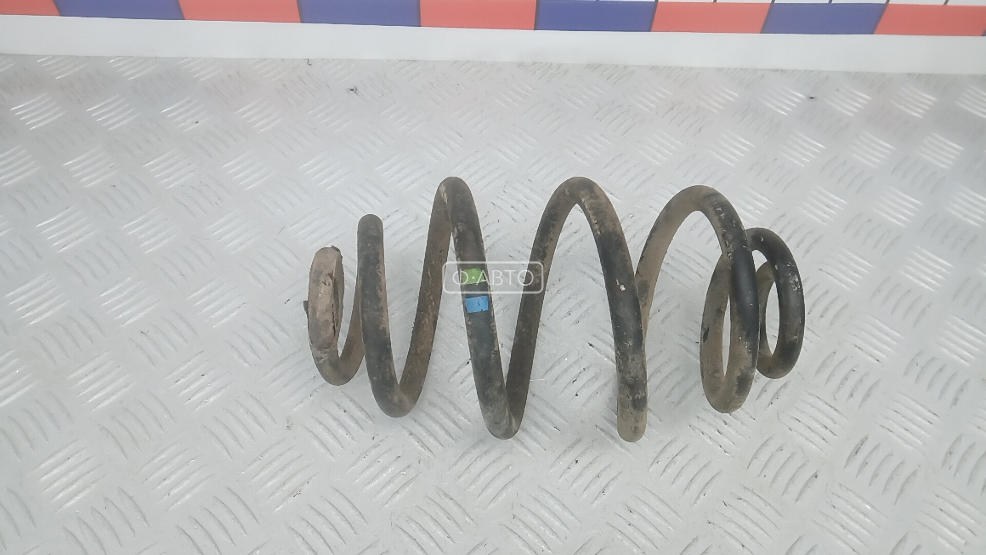 Пружина задняя