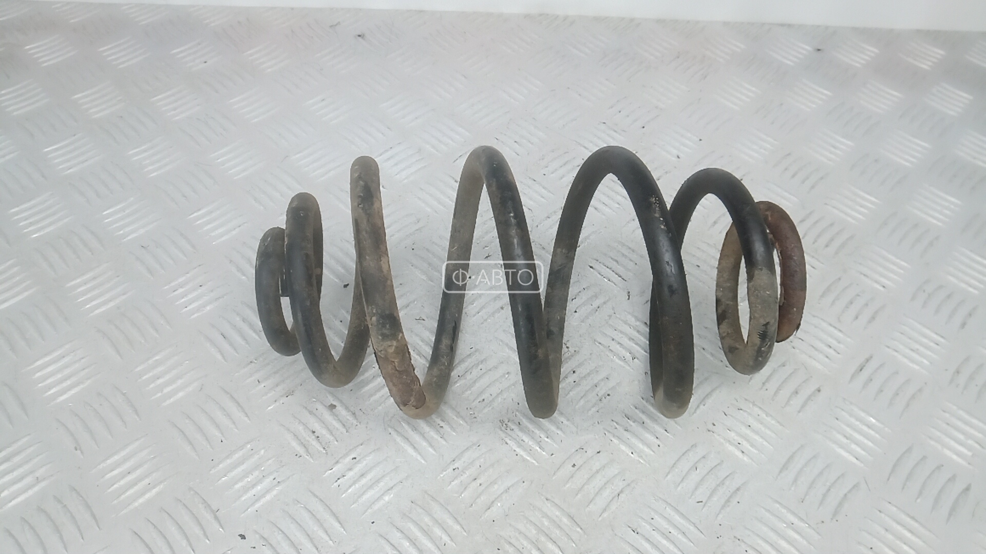 Пружина задняя