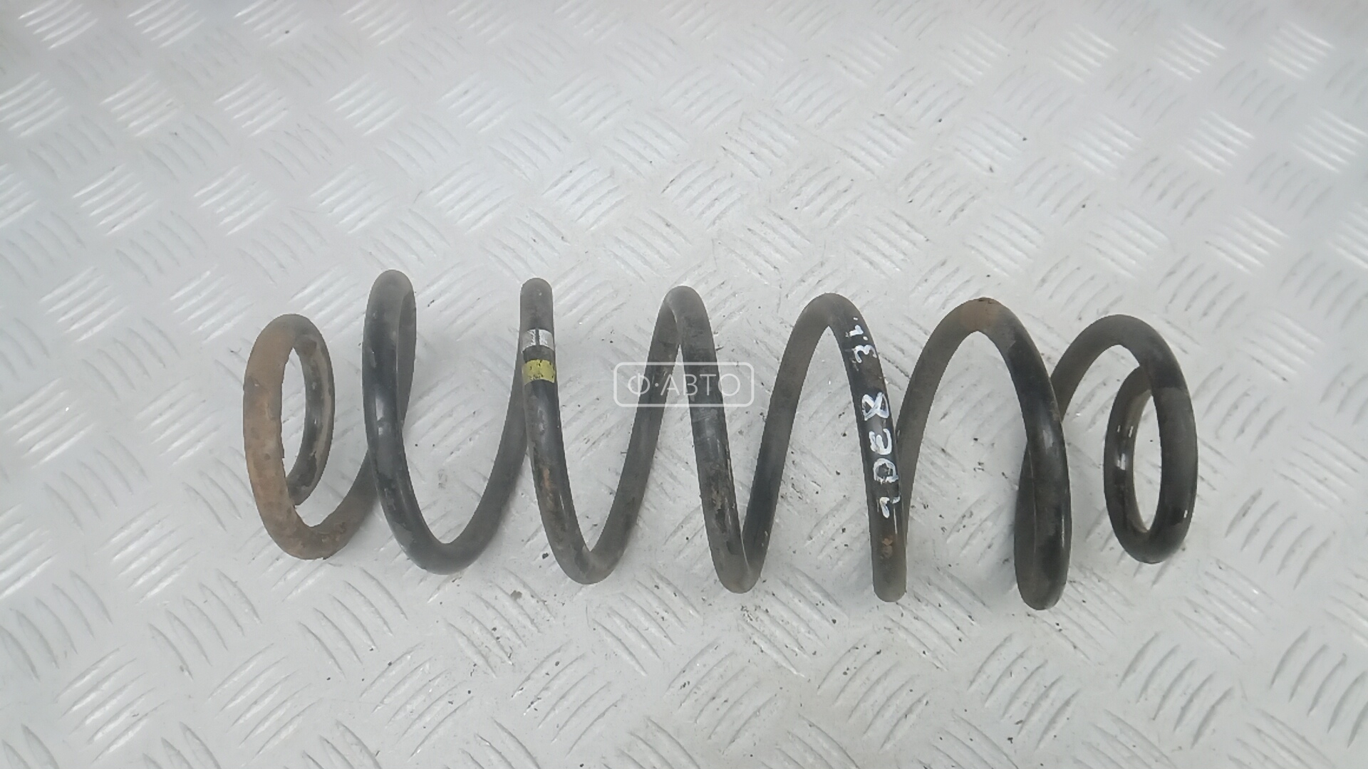 Пружина задняя