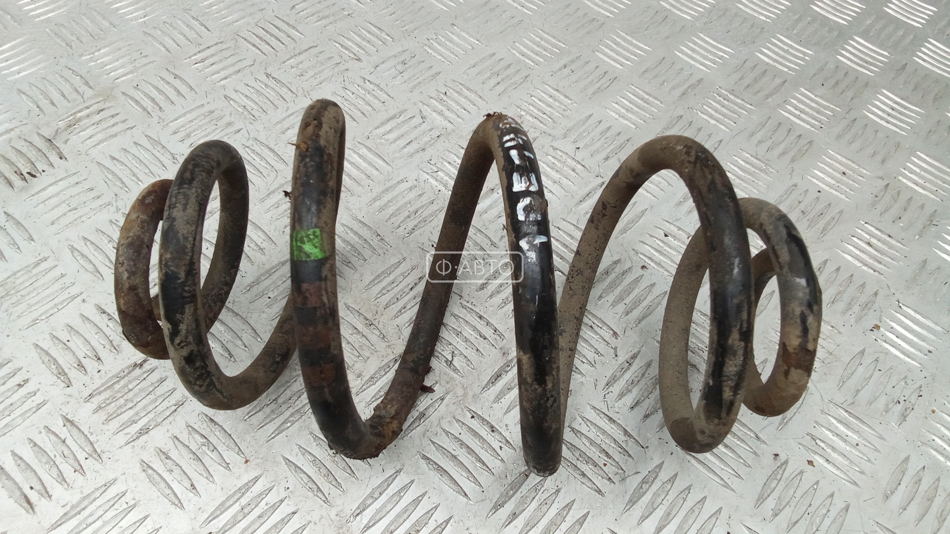 Пружина задняя