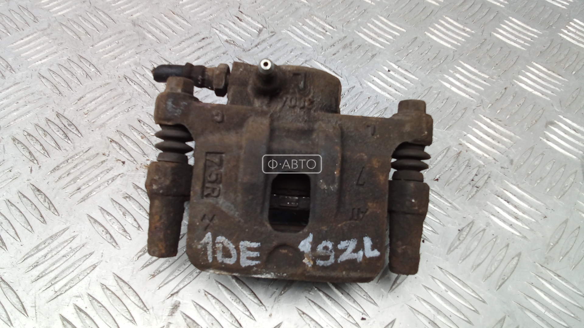 Суппорт тормозной задний левый