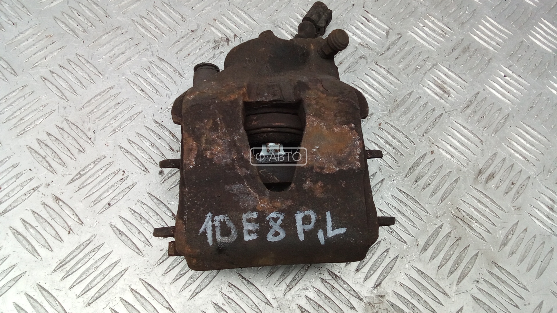 Суппорт тормозной передний левый