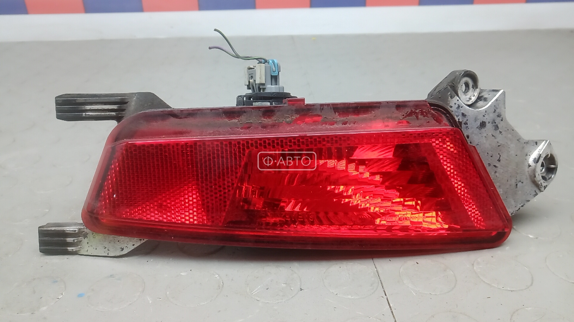Фонарь бампера задний правый