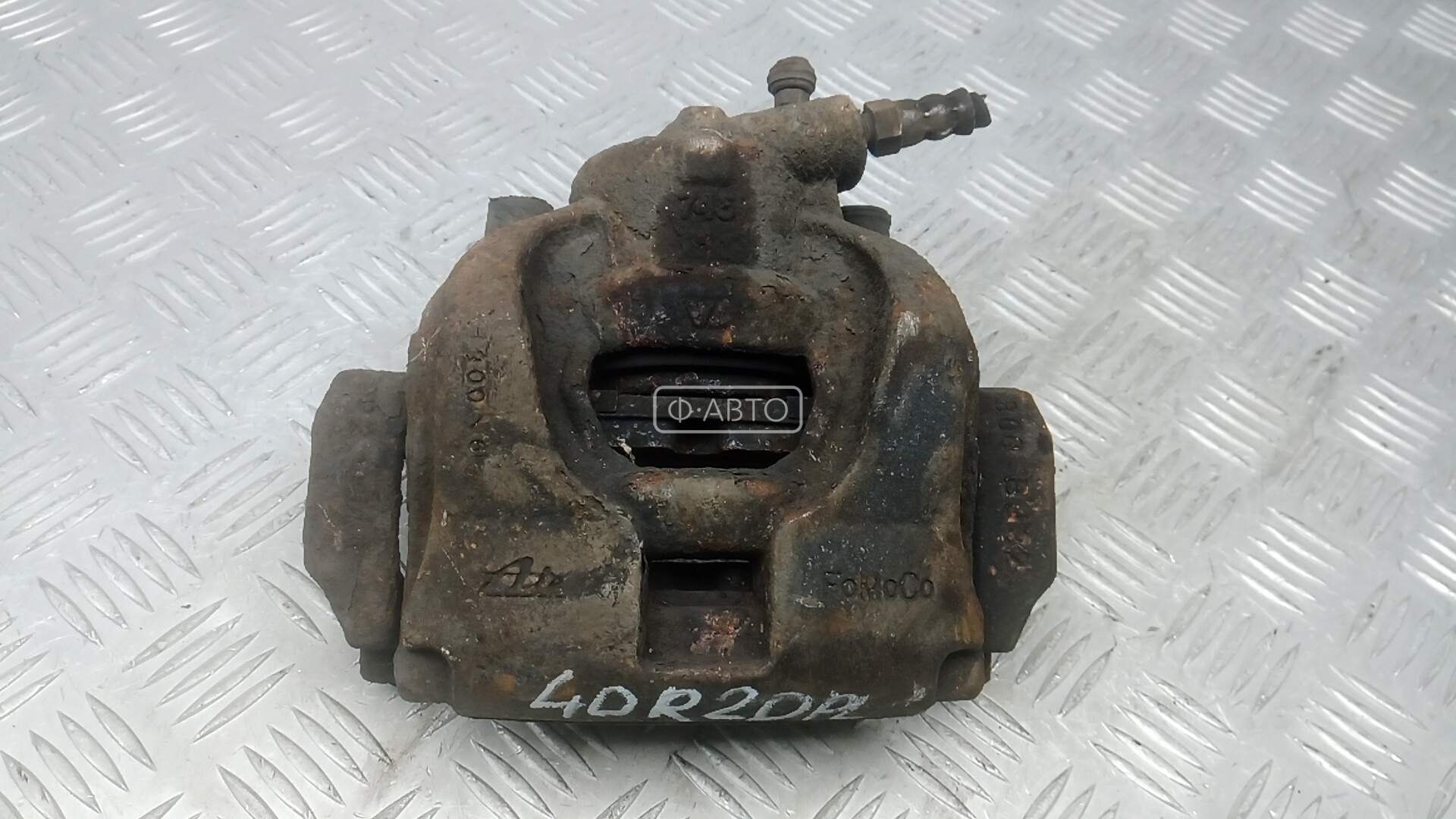 Суппорт тормозной передний левый