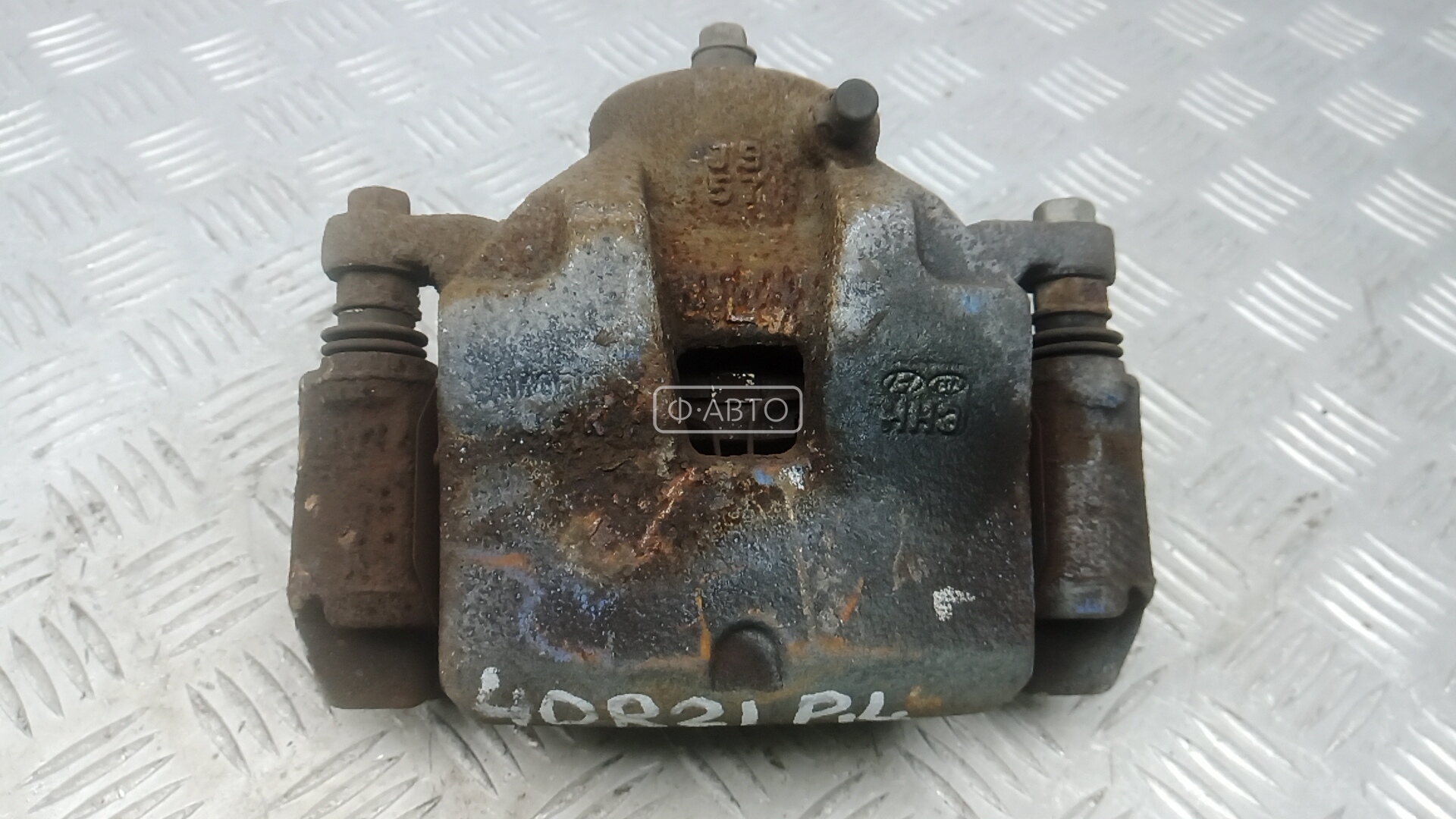 Суппорт тормозной передний левый