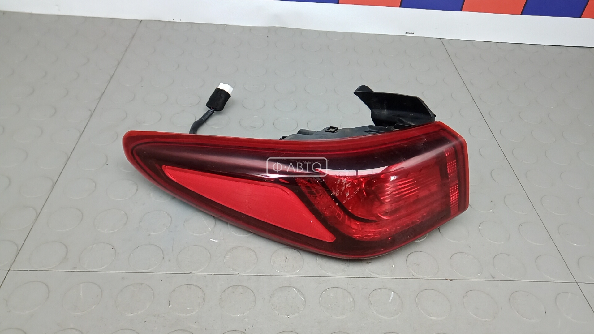 Фонарь задний левый