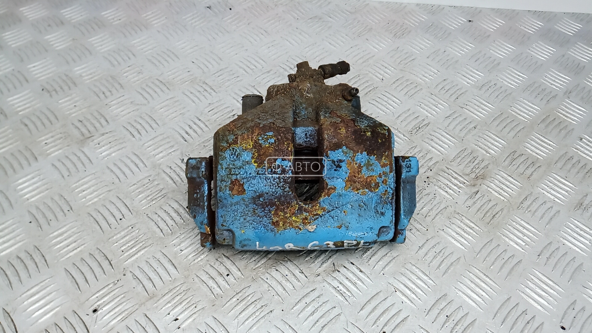 Суппорт тормозной передний левый