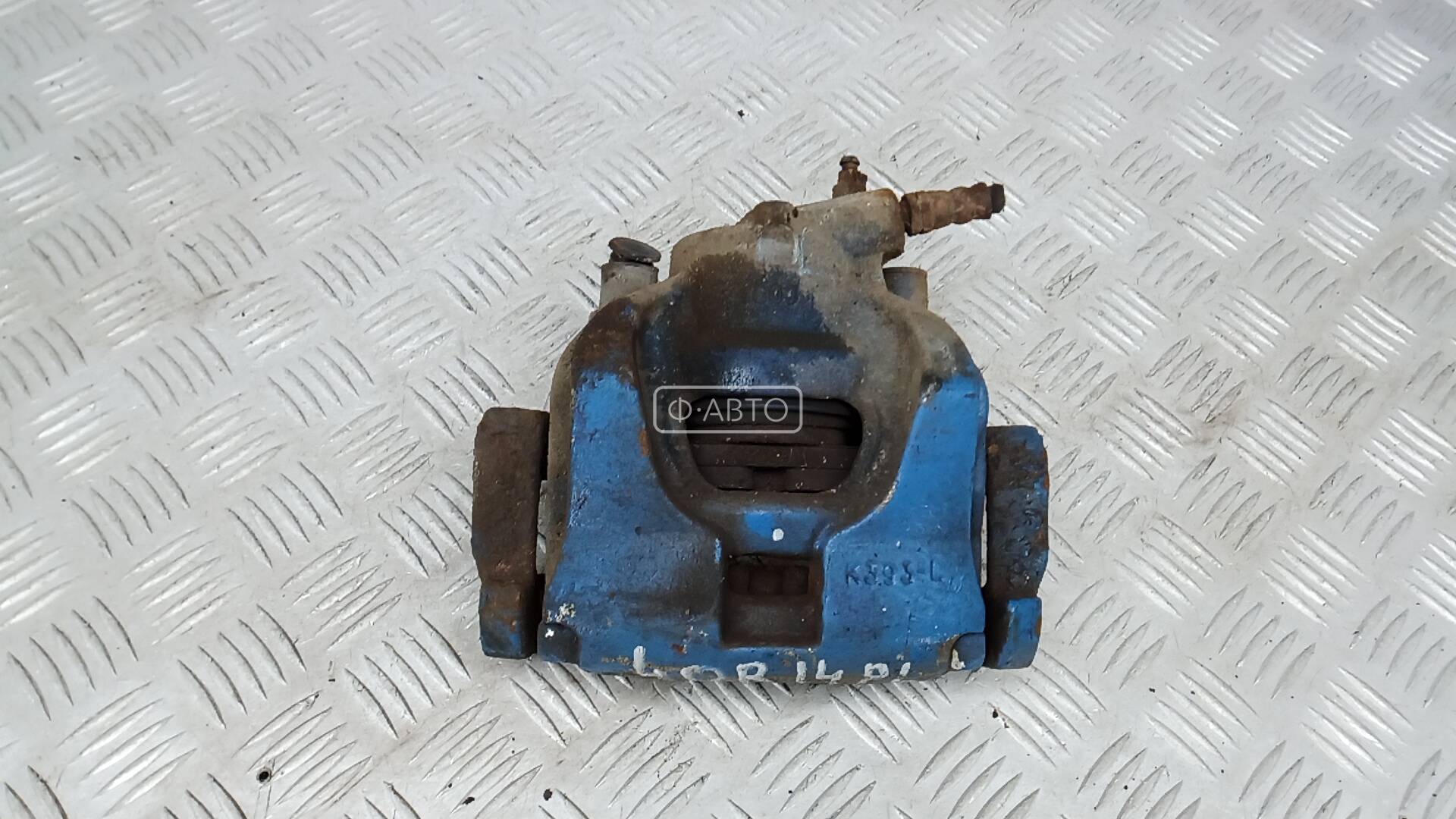 Суппорт тормозной передний левый