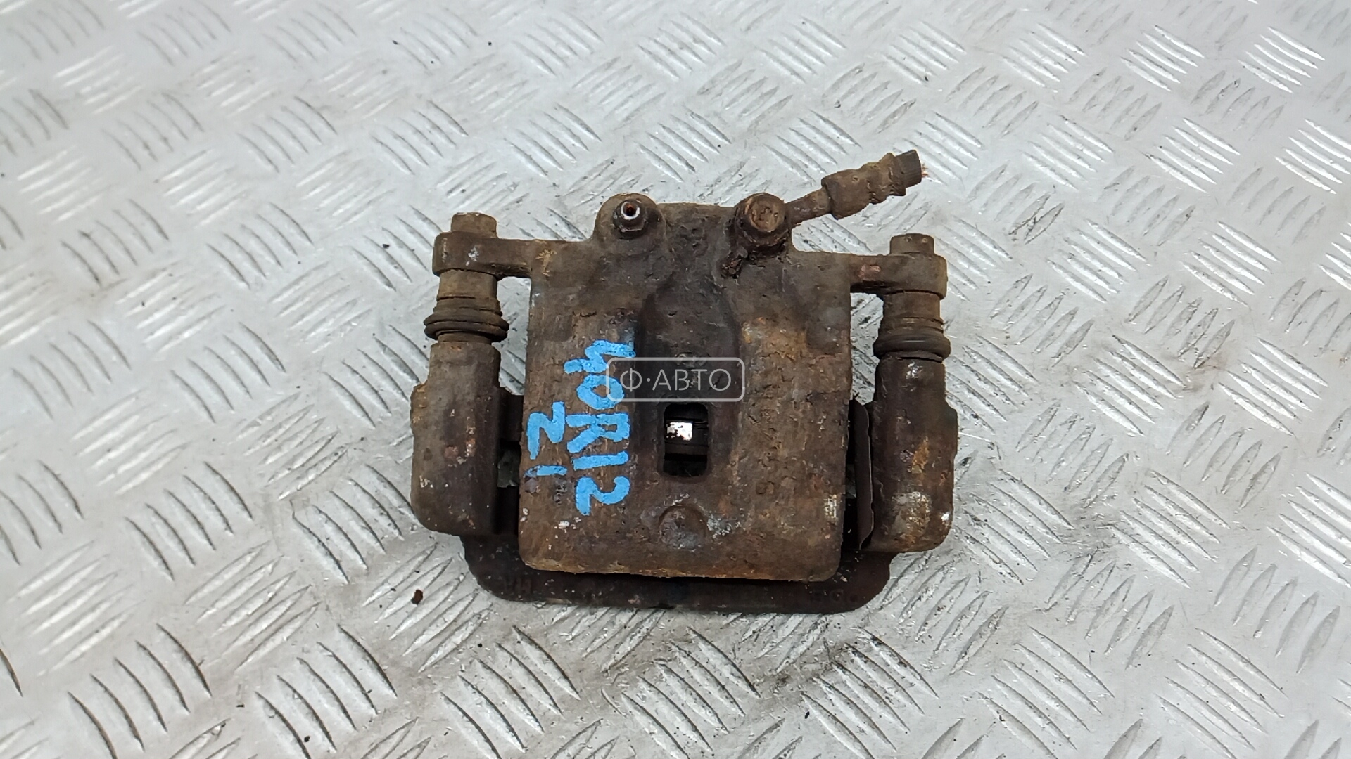 Суппорт тормозной задний левый