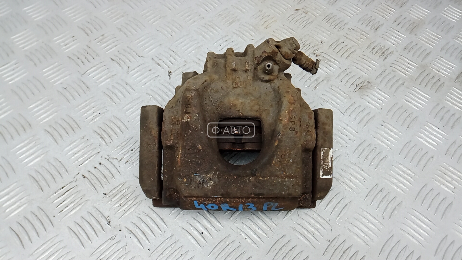 Суппорт тормозной передний левый