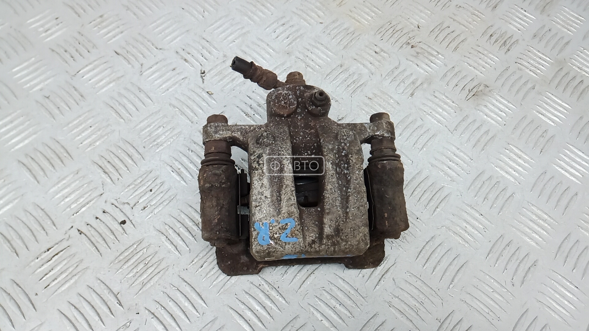 Суппорт тормозной задний правый