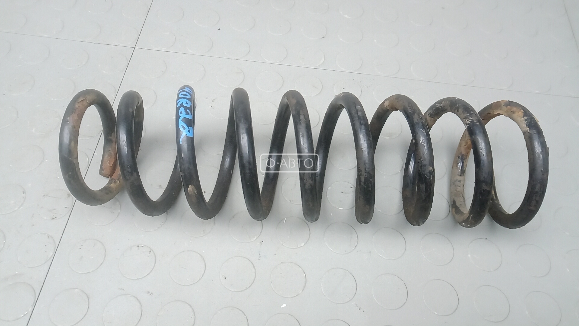 Пружина задняя