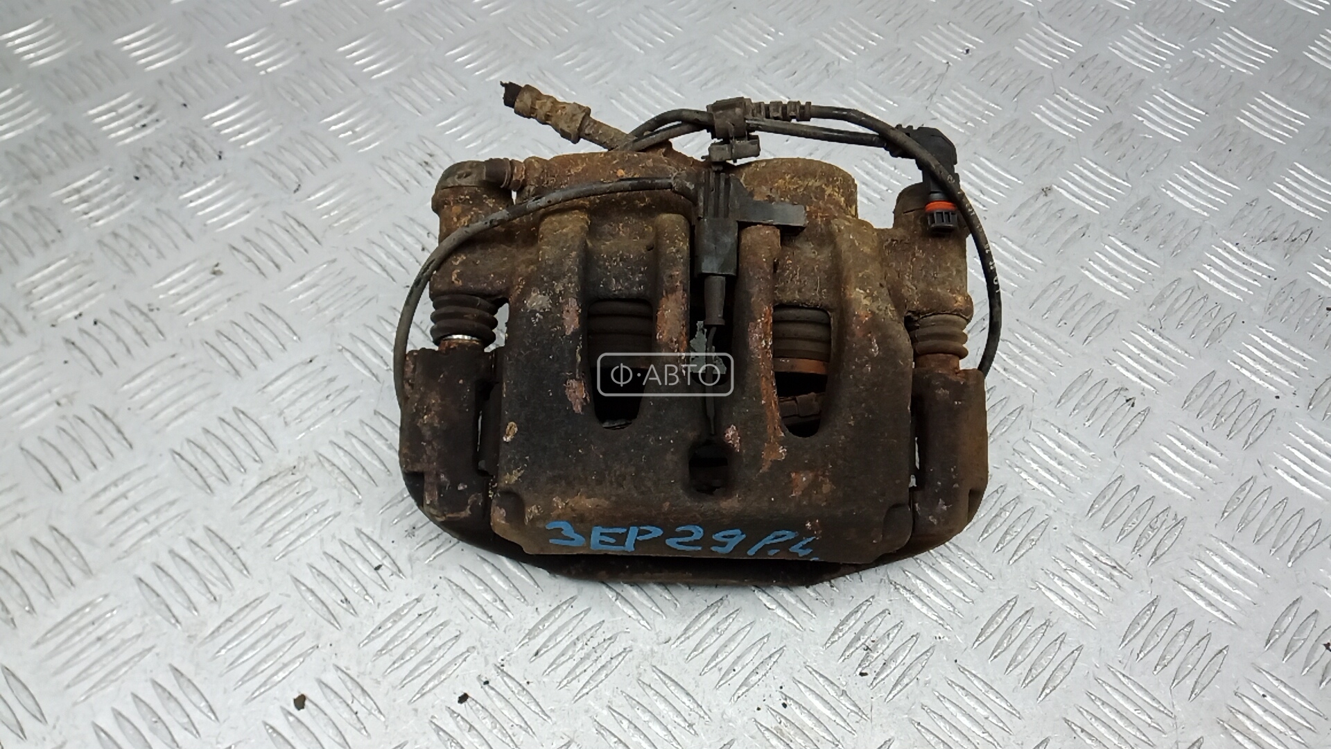 Суппорт тормозной передний левый