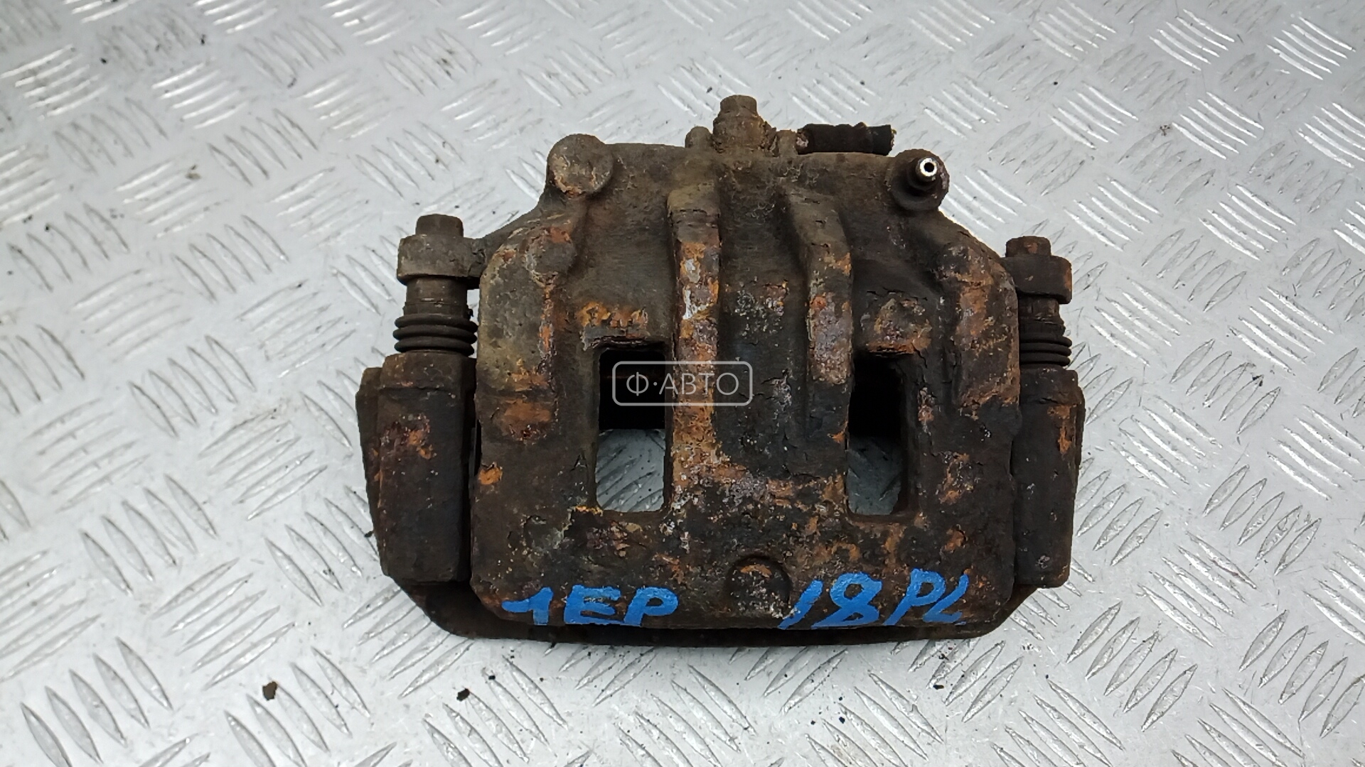 Суппорт тормозной передний левый