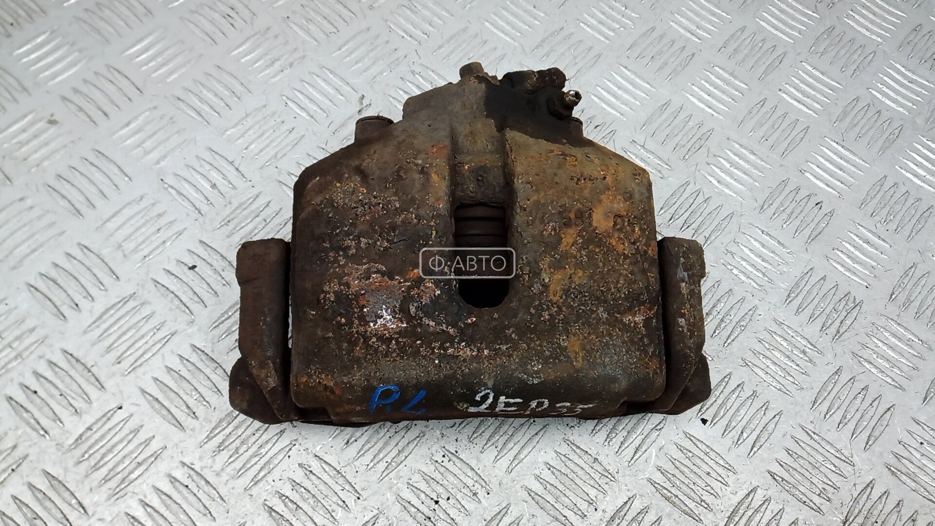 Суппорт тормозной передний левый