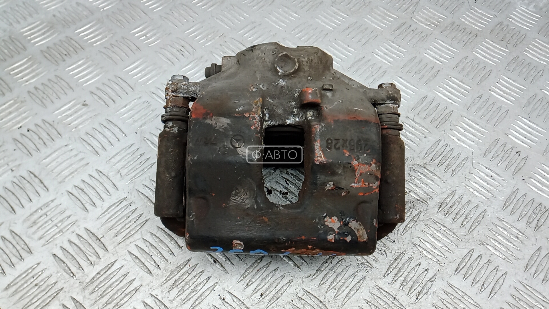 Суппорт тормозной передний левый