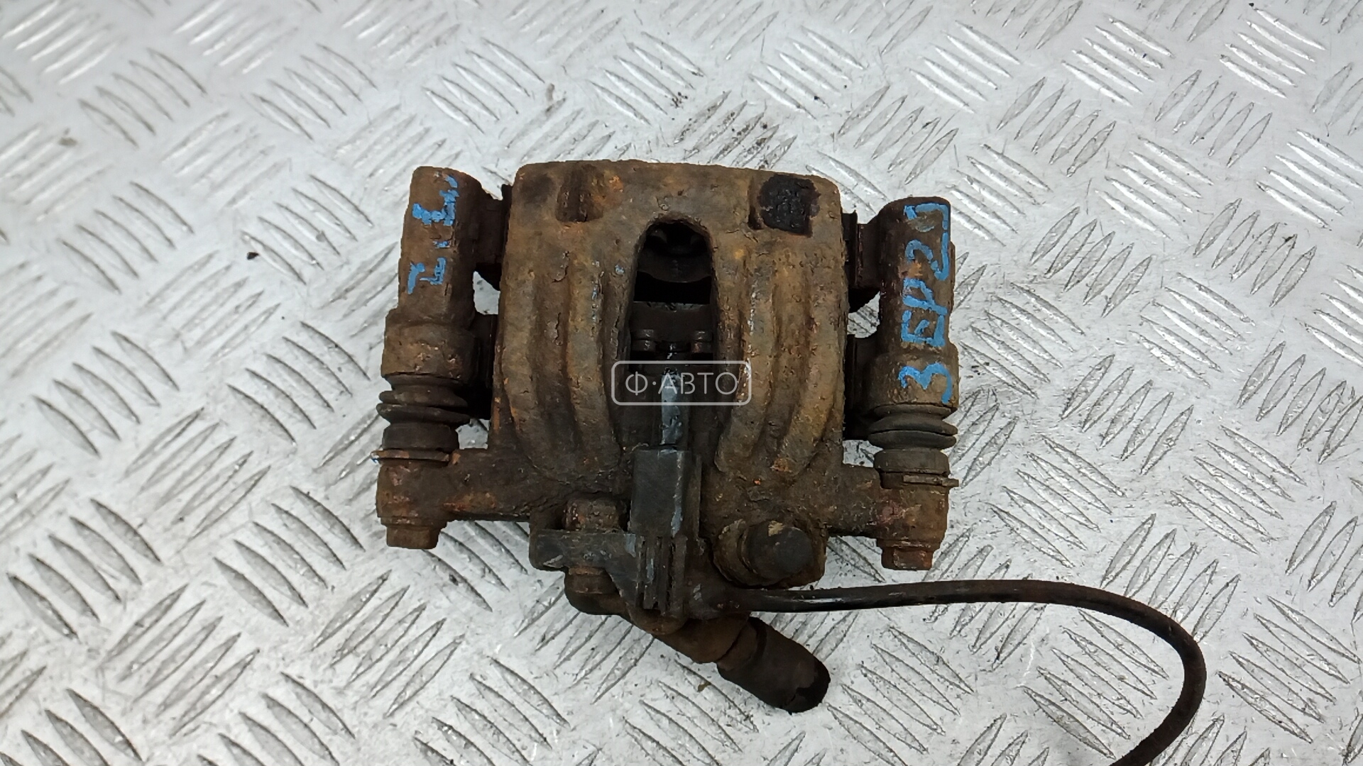 Суппорт тормозной задний левый