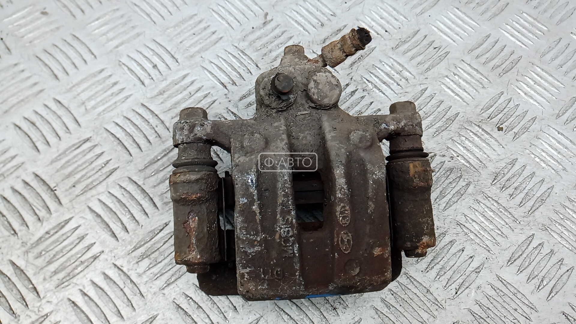 Суппорт тормозной задний левый