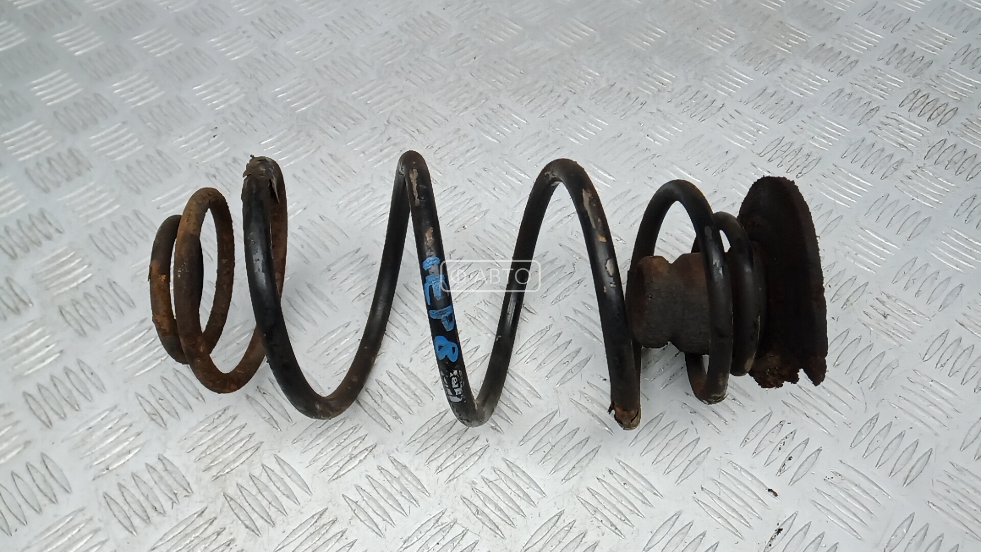 Пружина задняя