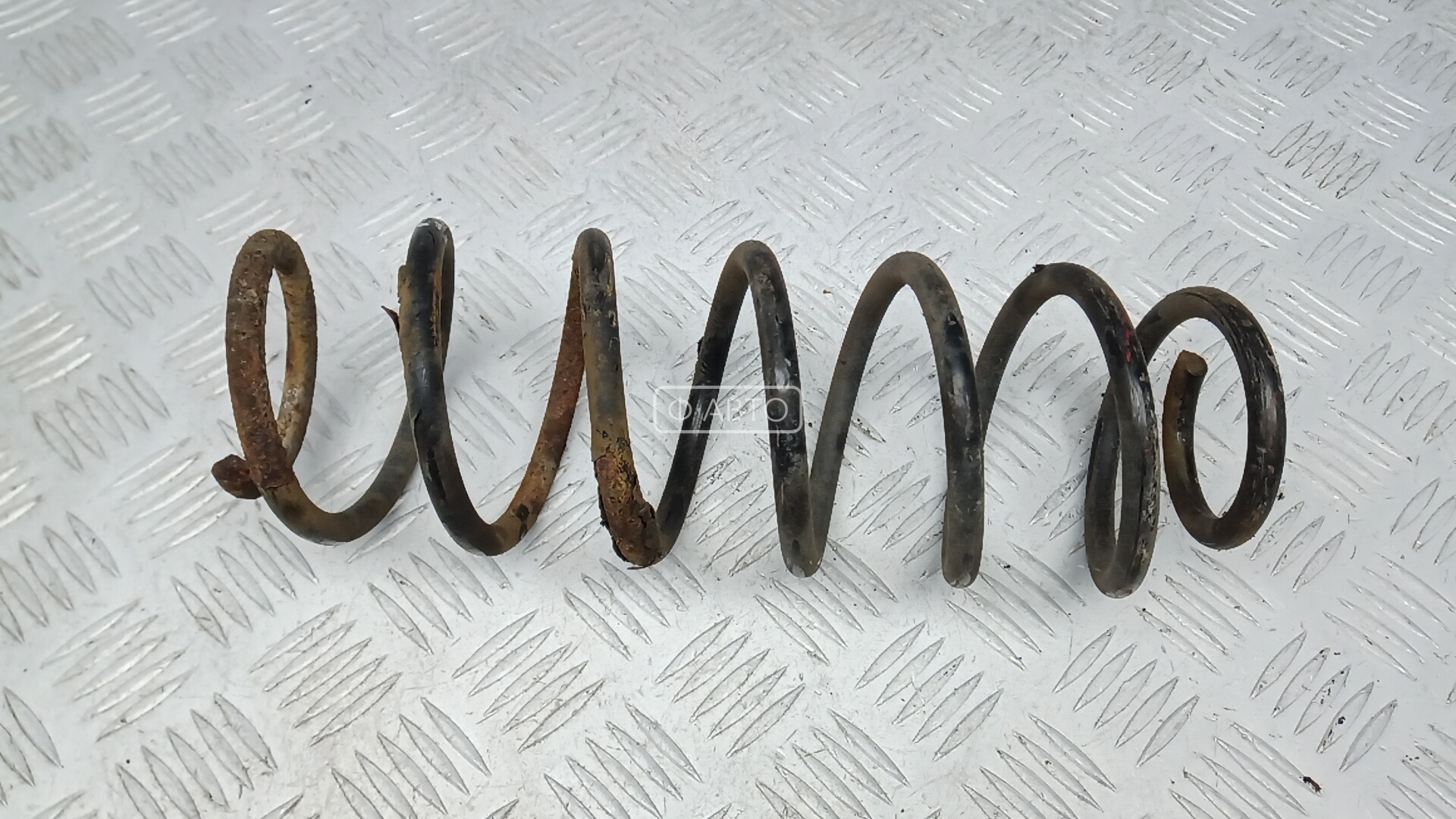 Пружина задняя