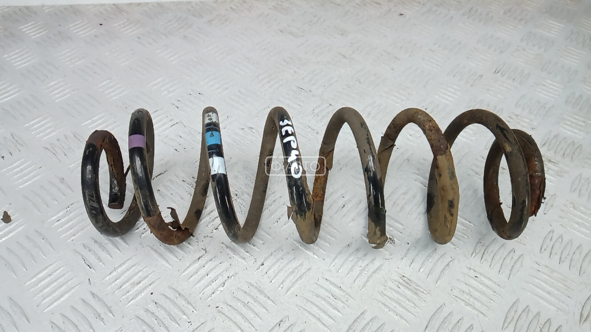 Пружина задняя