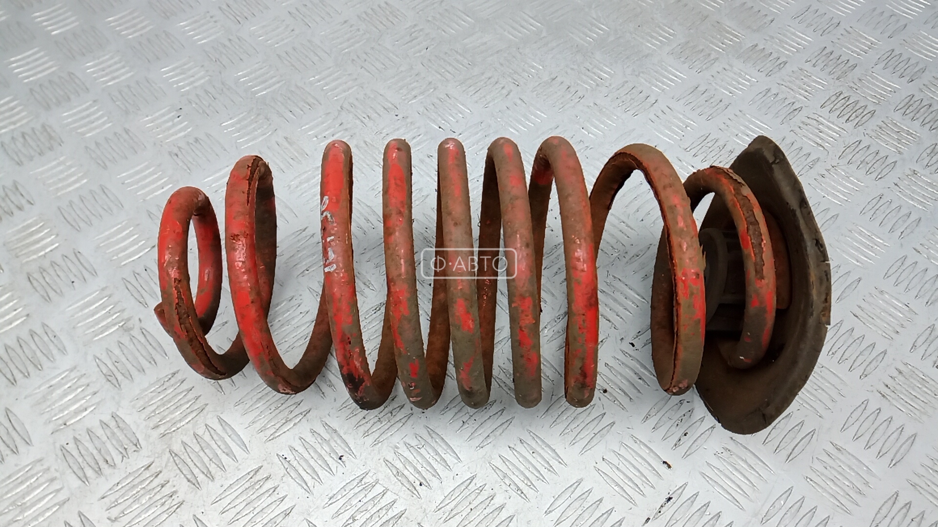 Пружина задняя