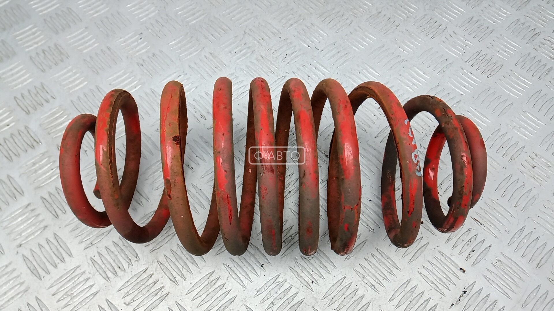 Пружина задняя