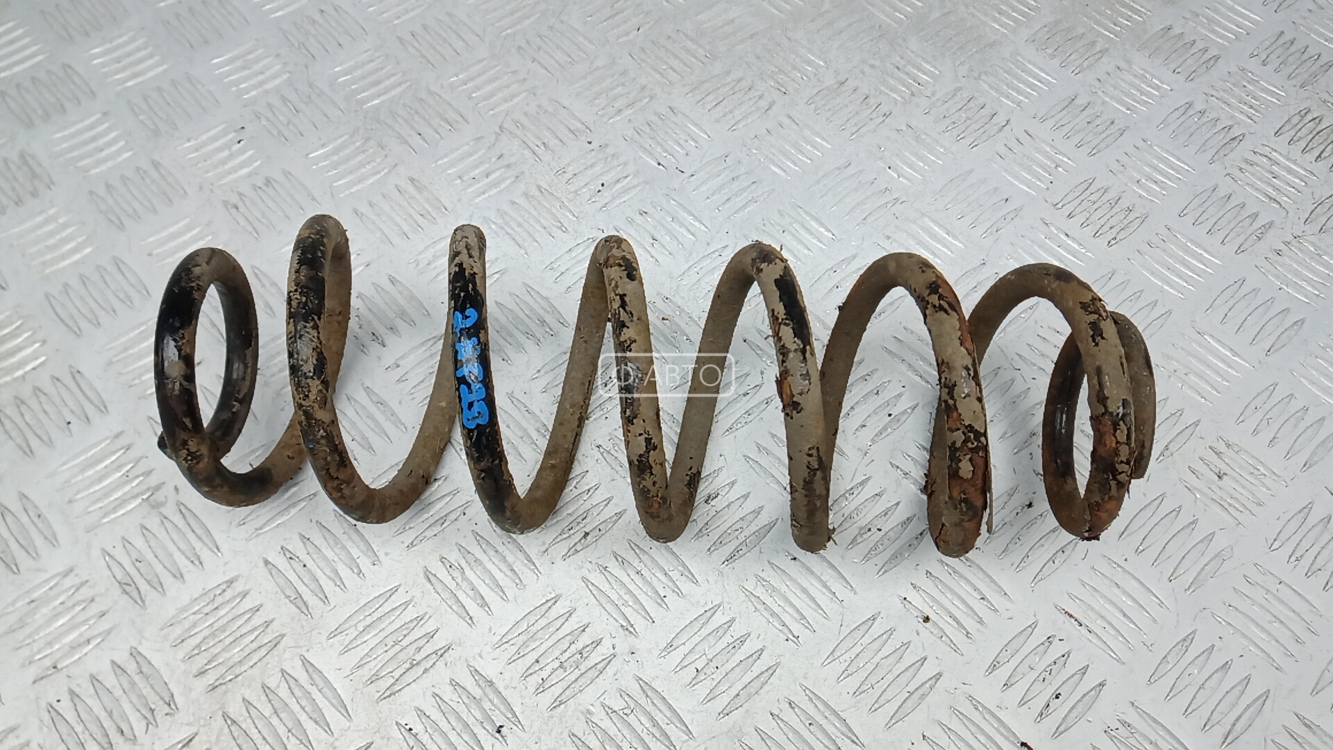 Пружина задняя