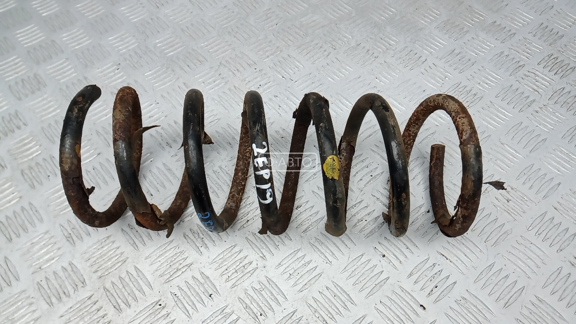 Пружина задняя