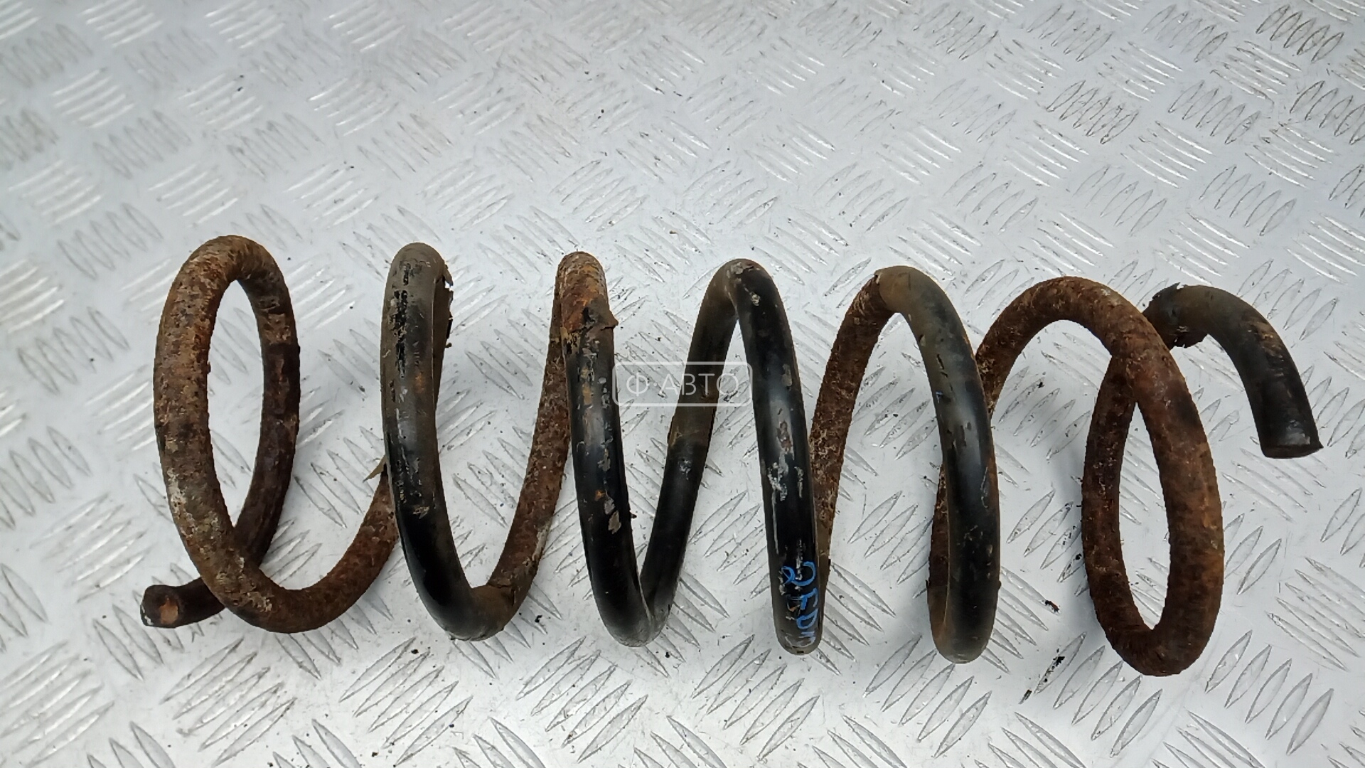 Пружина задняя