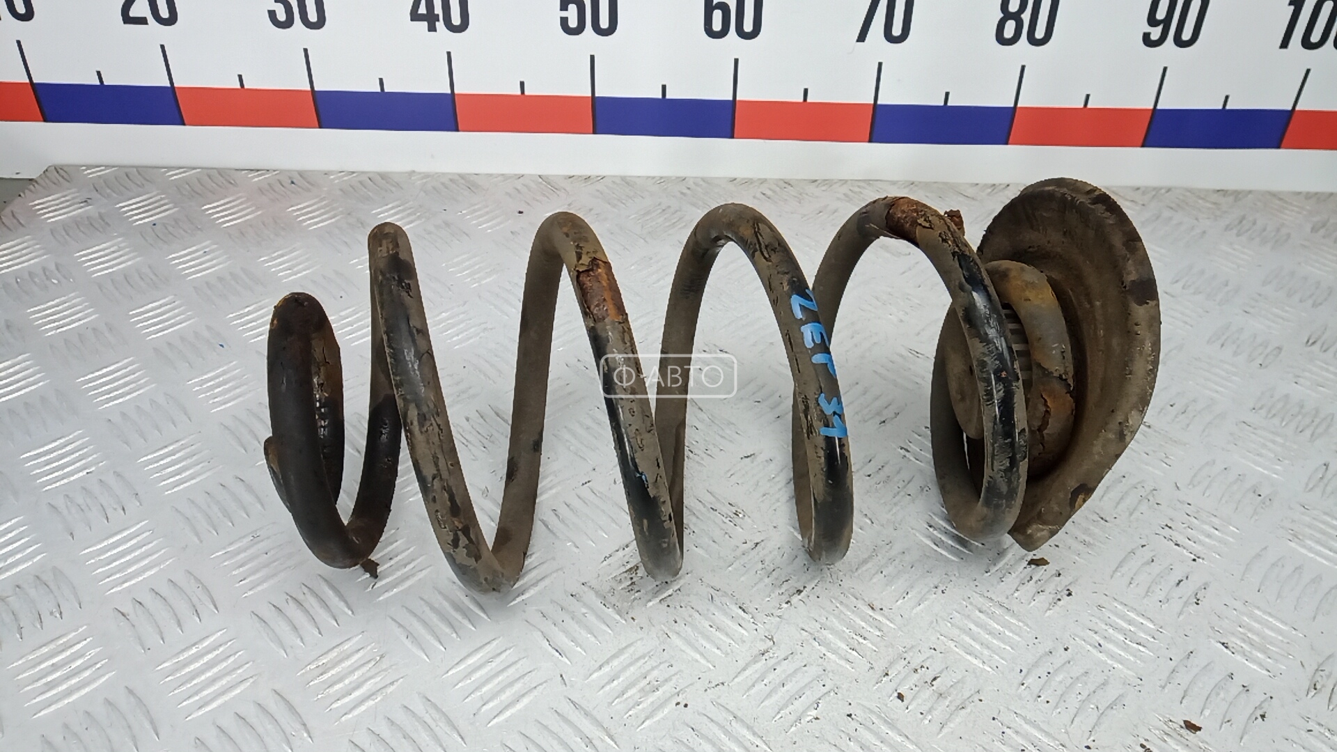 Пружина задняя