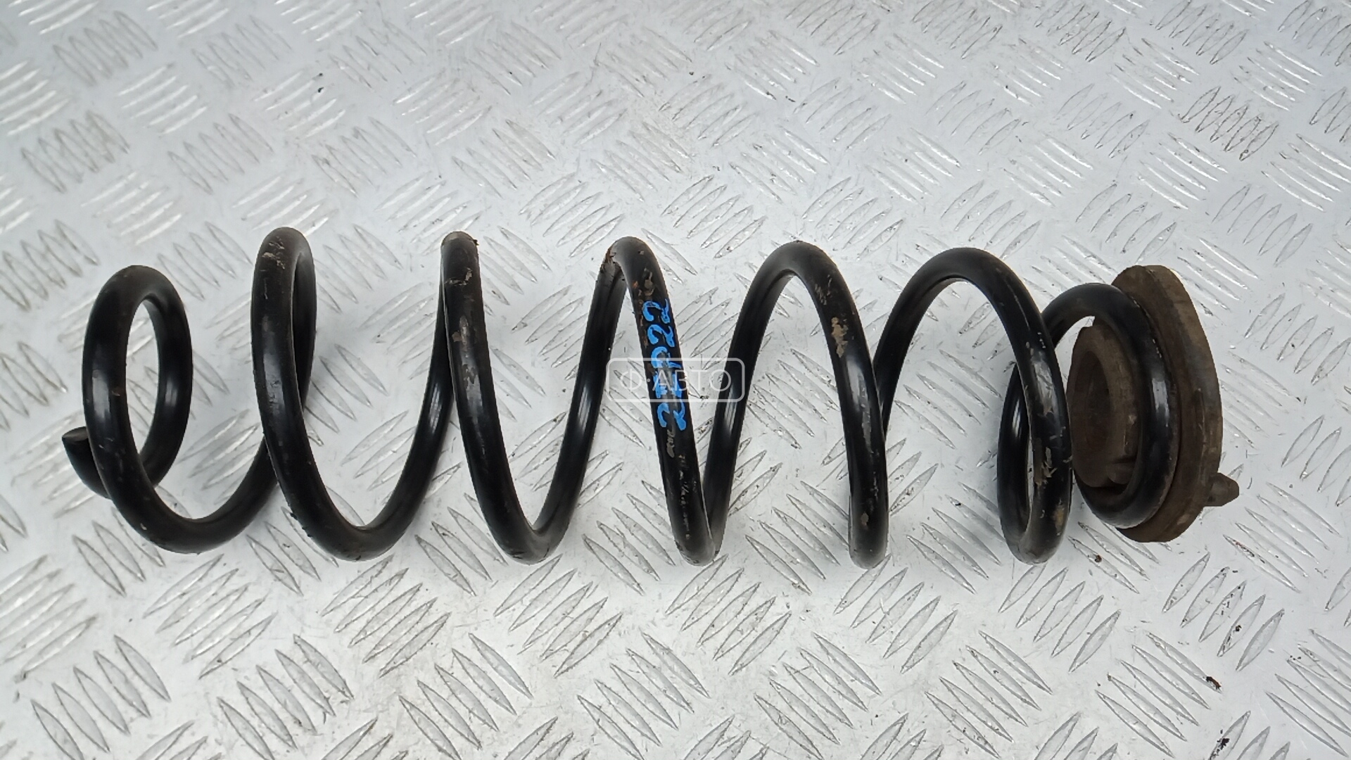 Пружина задняя